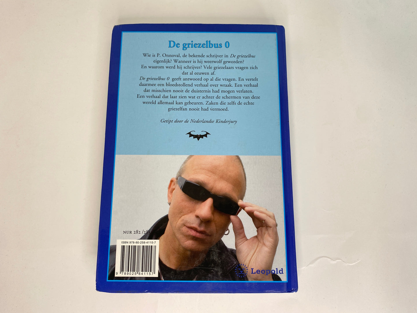 De Griezelbus 0 van Paul van Loon, ISBN: 9789025841157, achterkant
