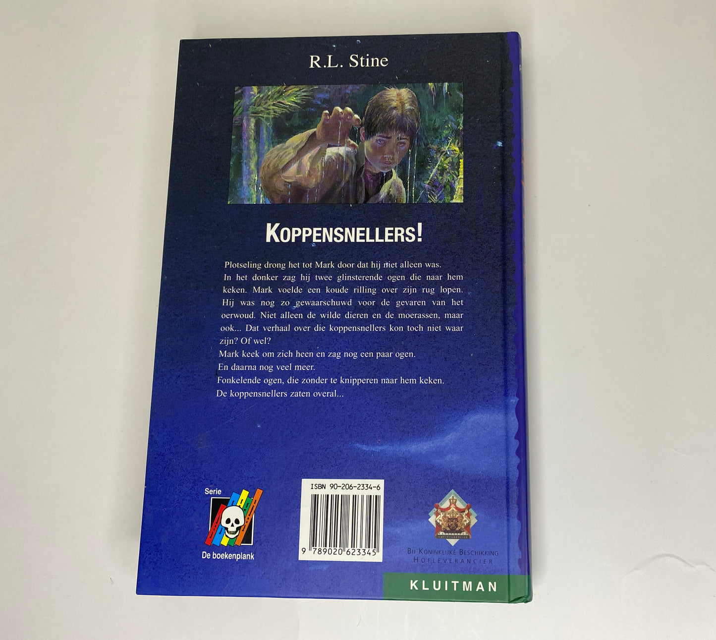 Koppensnellers! van R.L. Stine, boek 22 in de Kippenvel, ISBN: 9789020623345, achterkant