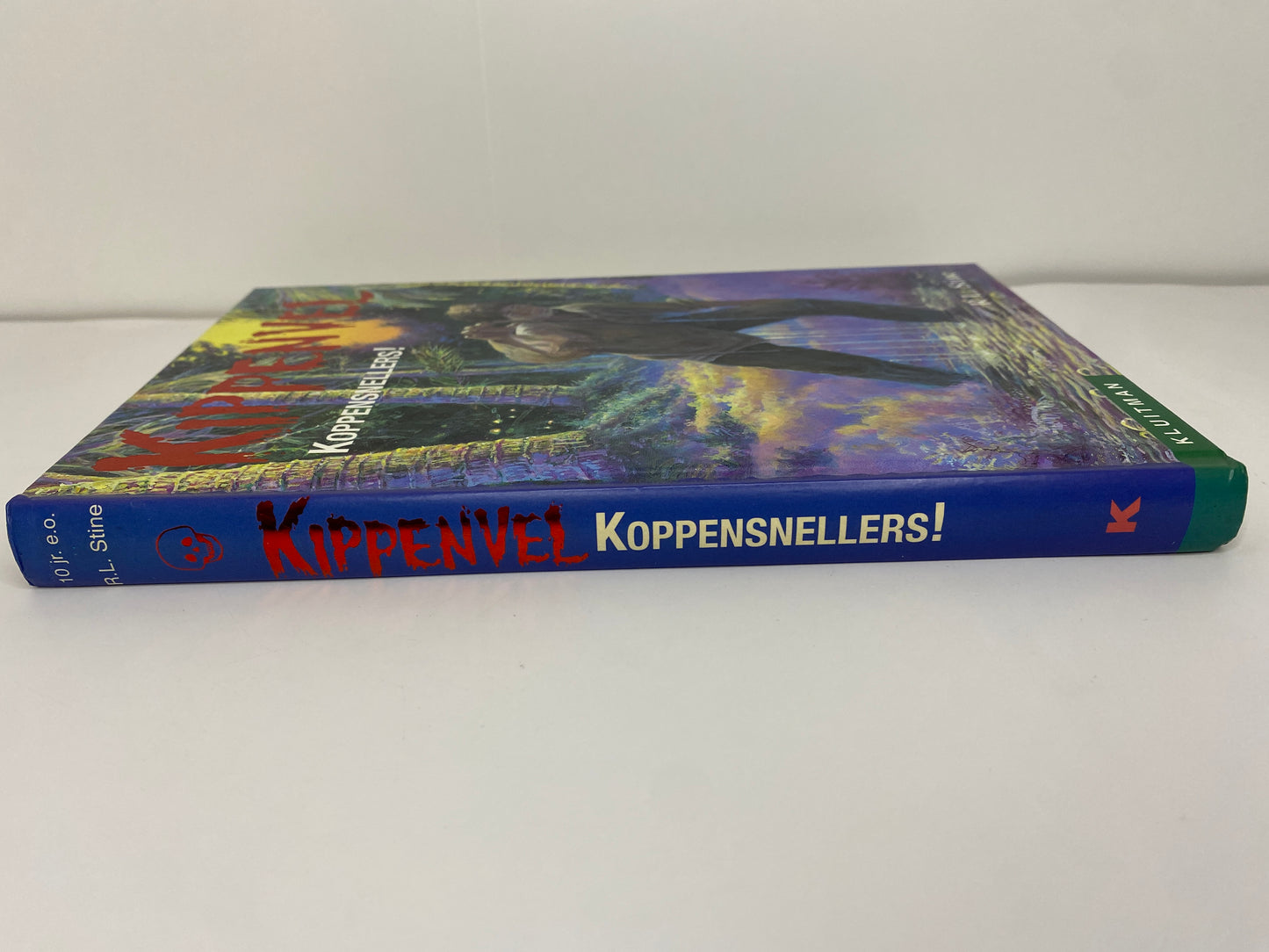Koppensnellers! van R.L. Stine, boek 22 in de Kippenvel, ISBN: 9789020623345 rug