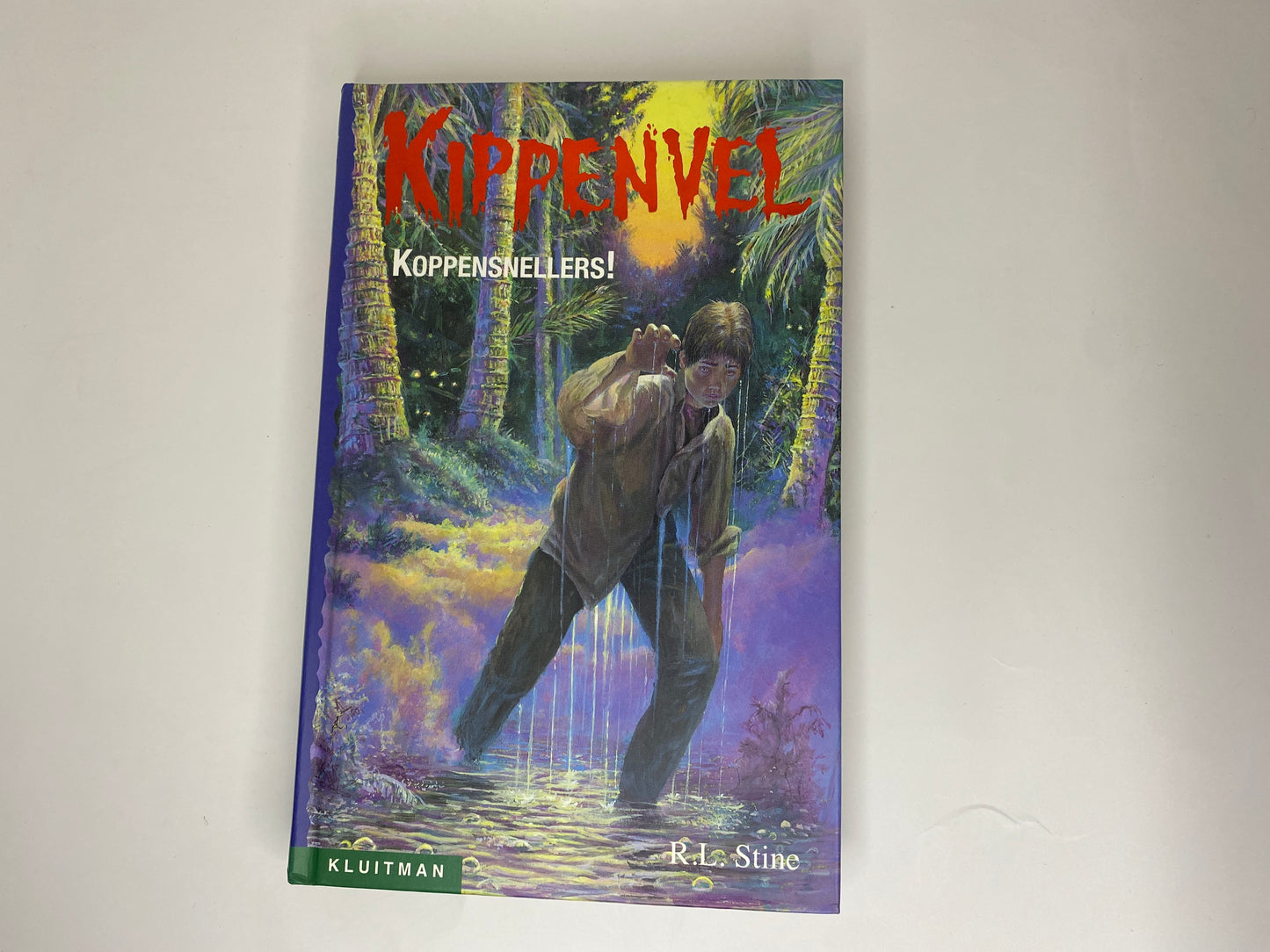 Koppensnellers! van R.L. Stine, boek 22 in de Kippenvel, ISBN: 9789020623345 , voorkant
