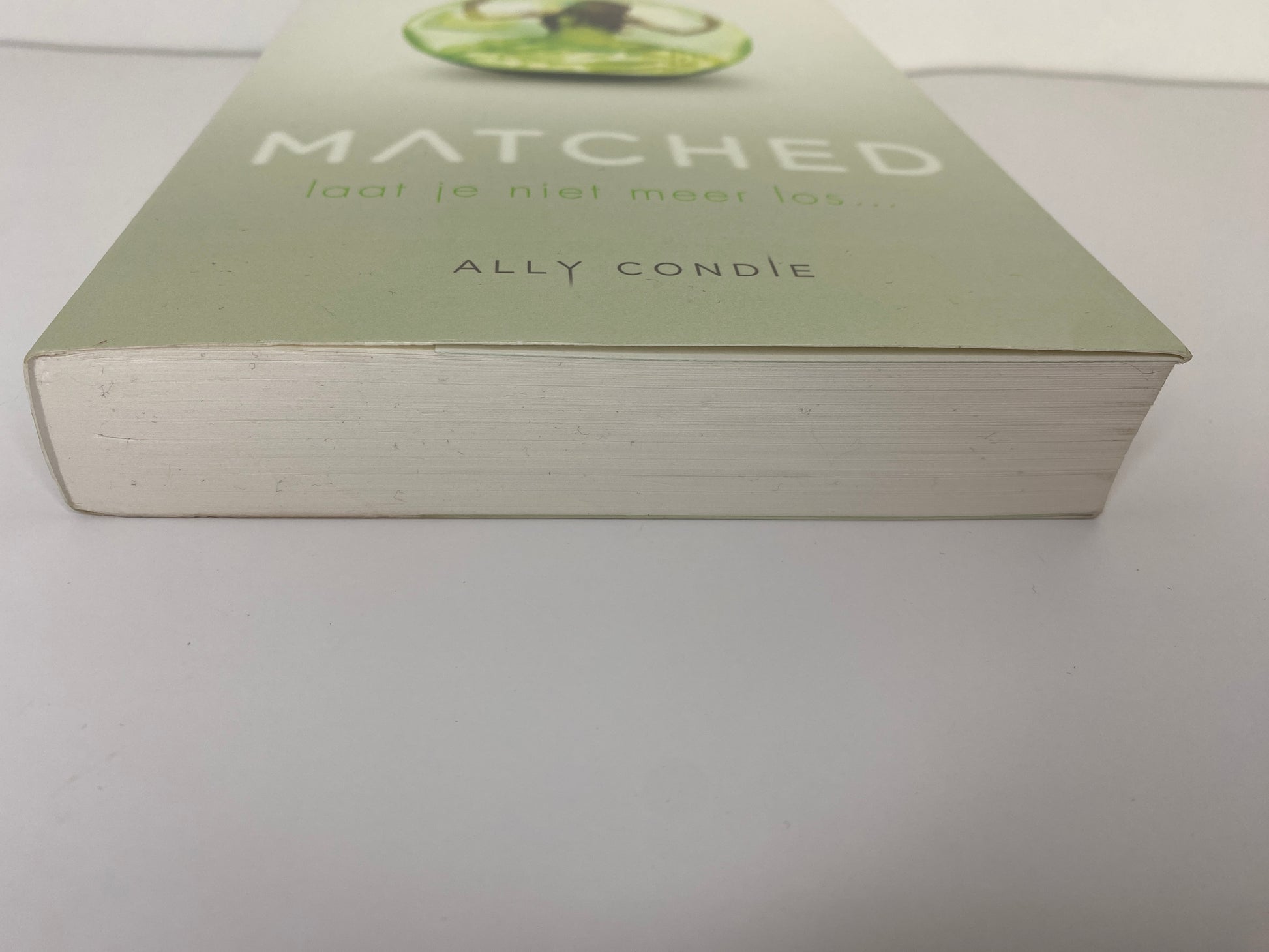 Matched van Ally Condie, boek 1 in de Matched trilogie, ISBN: 9789047703198, onderkant