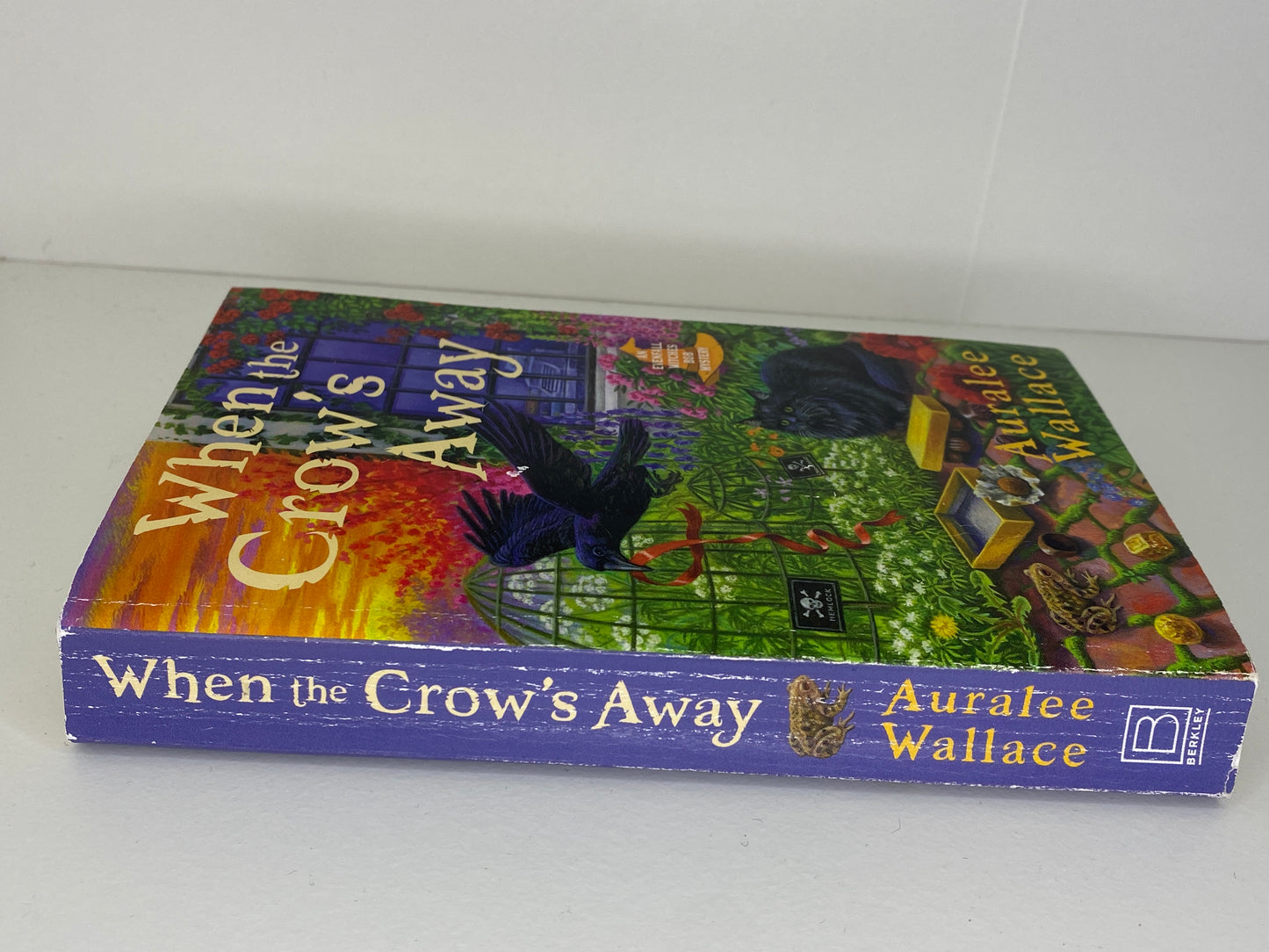 When the Crow's Away, book 2 in the Evenfall Witches B&B by Auralee Wallace, ISBN: 9780593335857 spine
