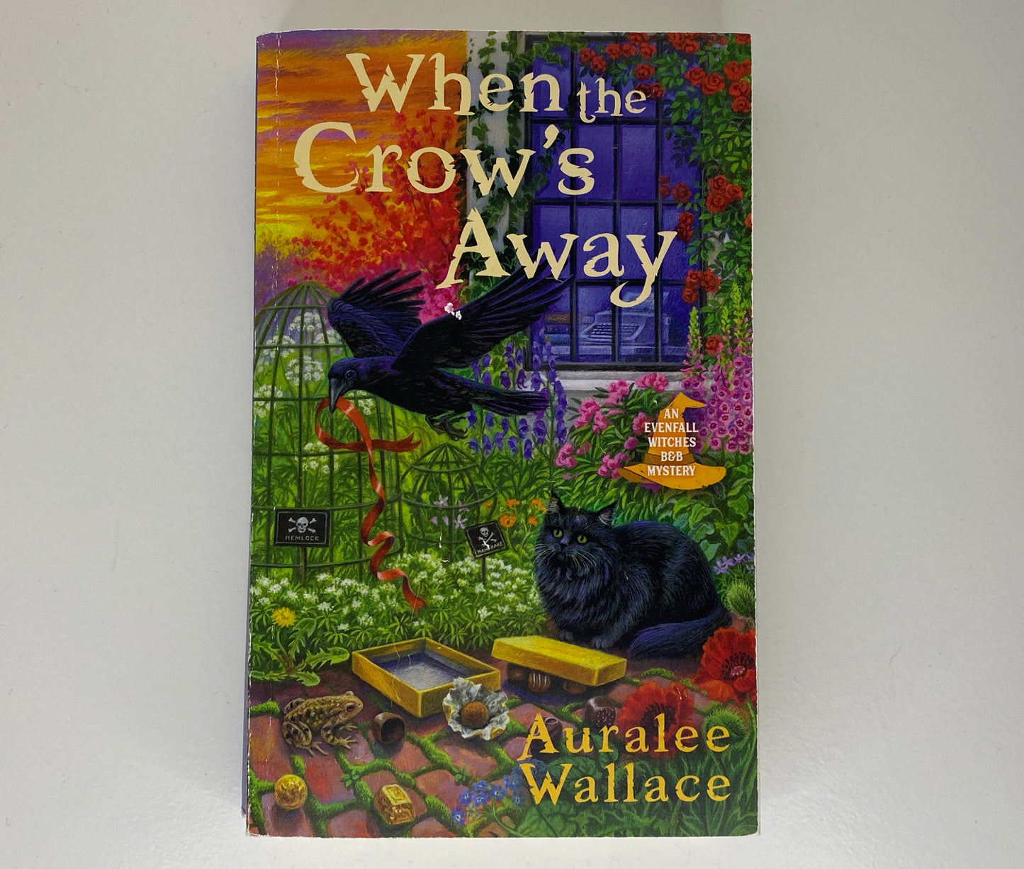 When the Crow's Away, book 2 in the Evenfall Witches B&B by Auralee Wallace, ISBN: 9780593335857 front